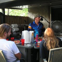 Photo Thumbnail #17: We added a sink and bar with chairs to the out...