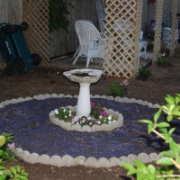 Photo Thumbnail #11: Birdbath is next to the trellis house