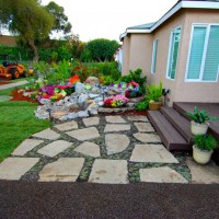 Photo Thumbnail #24: Broken concrete was reused for the front walk way