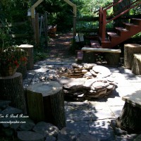 Photo Thumbnail #8: Stone Placed Firepit Using Flagstone and Logs -...