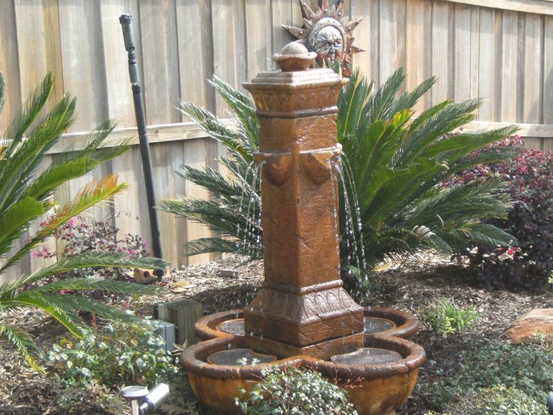 Fountain Yard Art in Backyard
