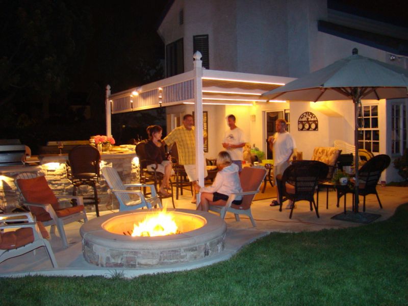 Backyard Firepit adds Lighting Focal Point