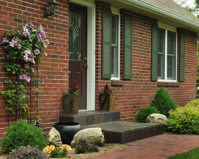 Trellis anchored against house