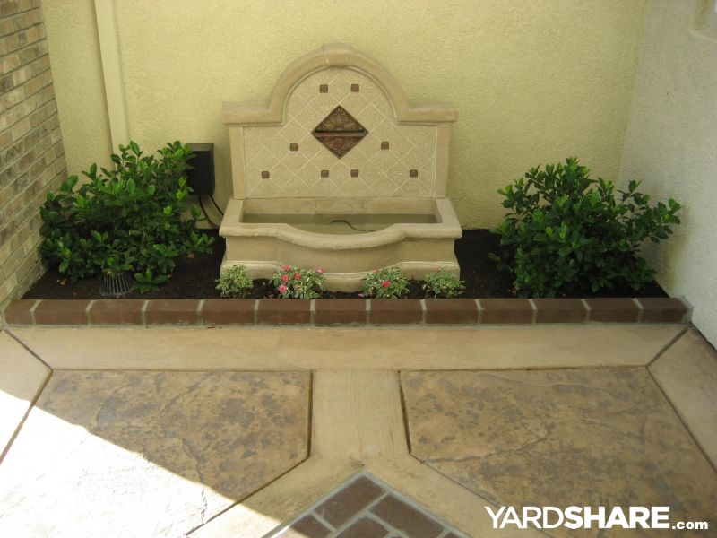 Front-yard accent lighting and path context from a real YardShare yard